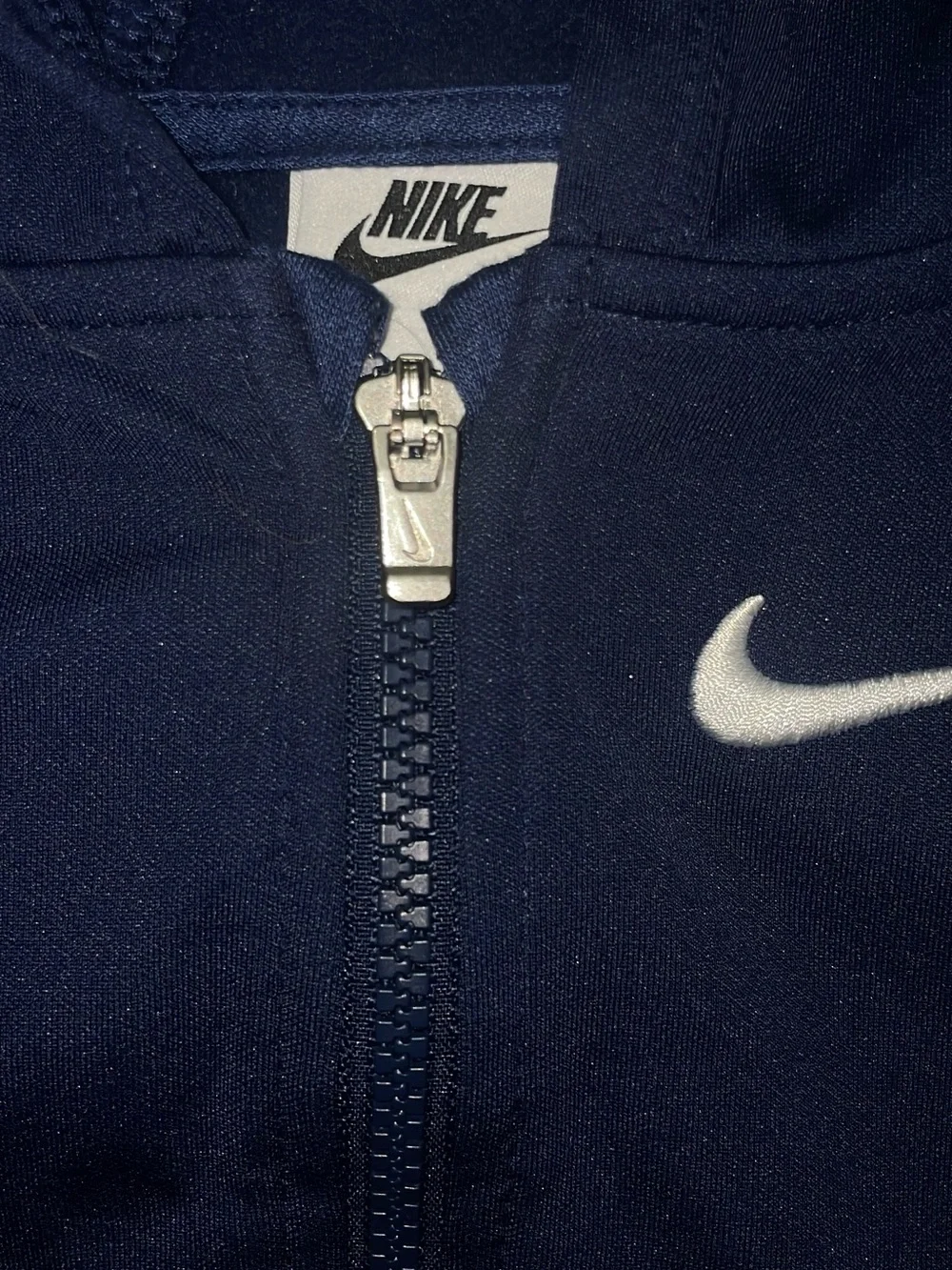 Nike Navy Zip Hoodie with White Swoosh Accent